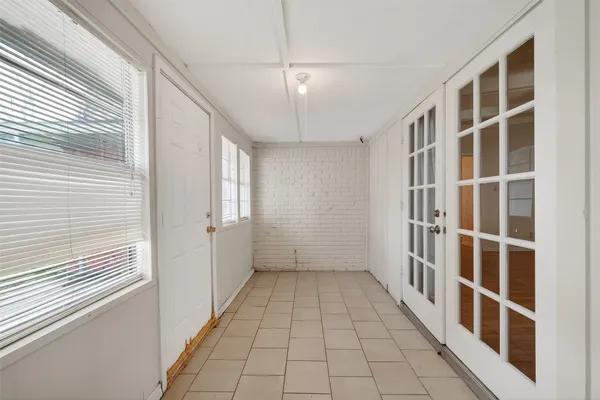 a view of entryway with stairs and wooden floor