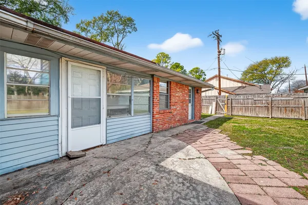 a view of backyard with green space
