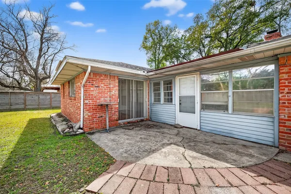 a view of a backyard with a small cabin