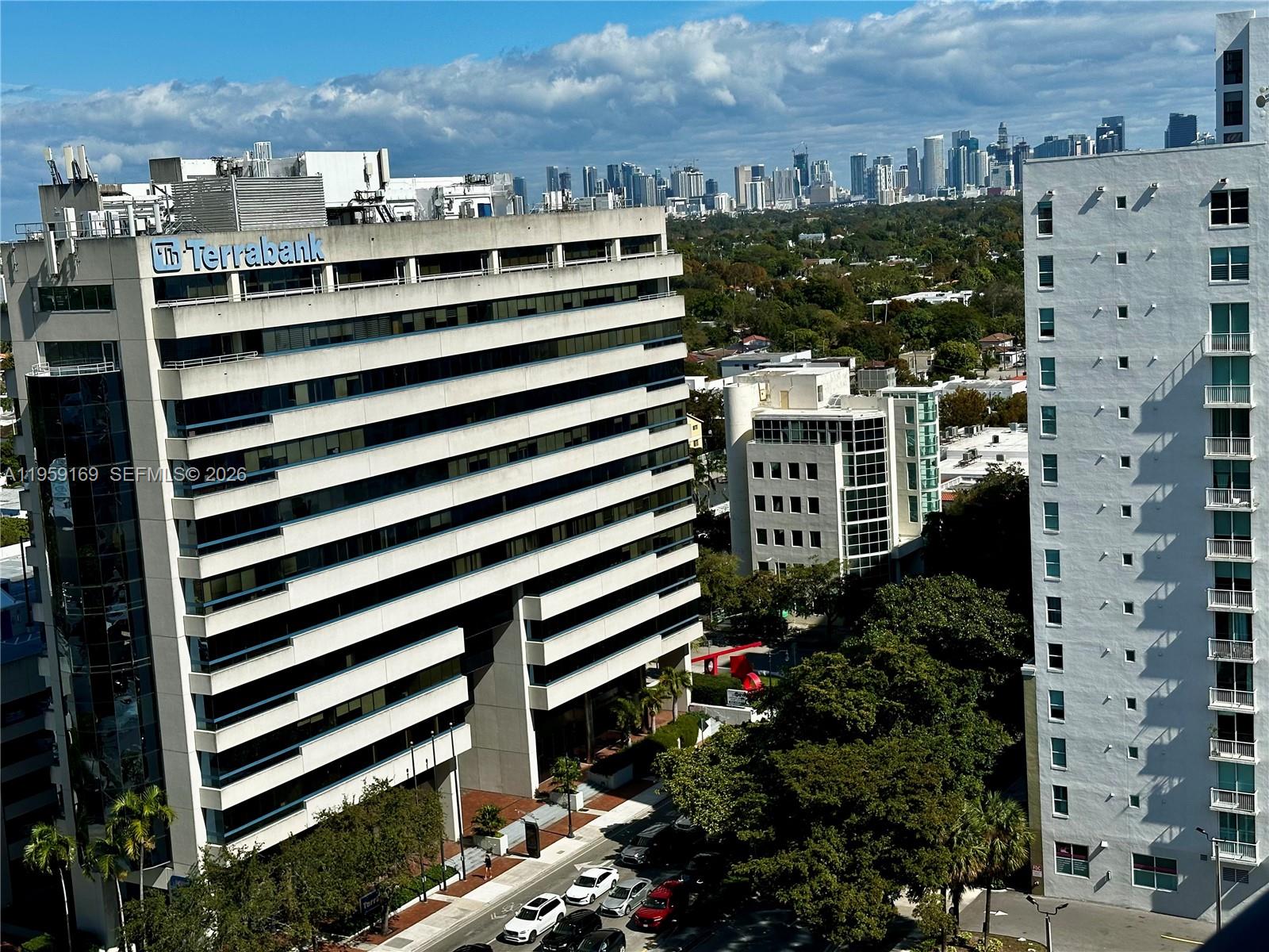 3232 Southwest 22nd Terrace, Unit 1604 Miami, FL 33145 - Photo 34 of 40 a city view with tall buildings