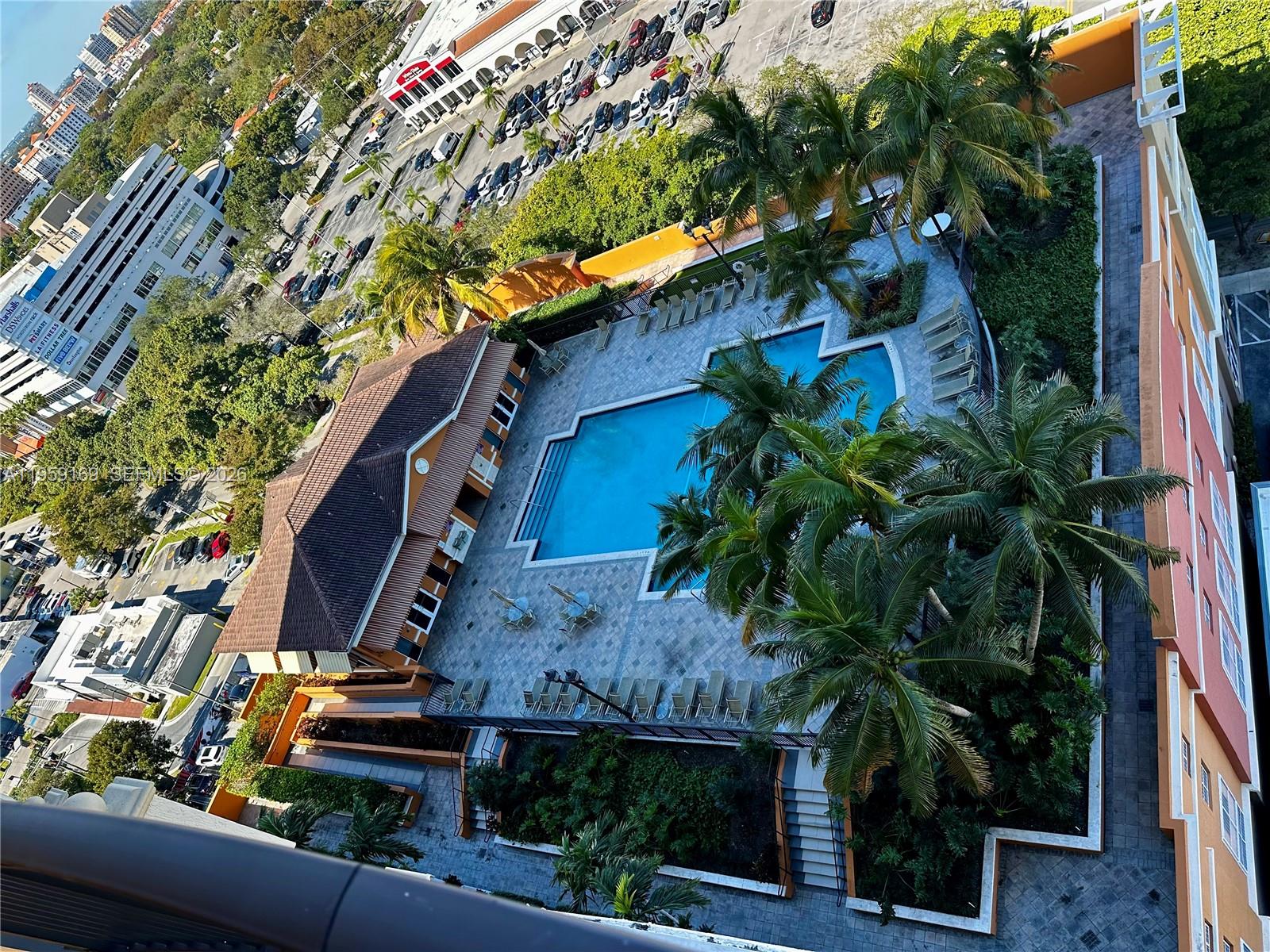 3232 Southwest 22nd Terrace, Unit 1604 Miami, FL 33145 - Photo 35 of 46 pool & gym