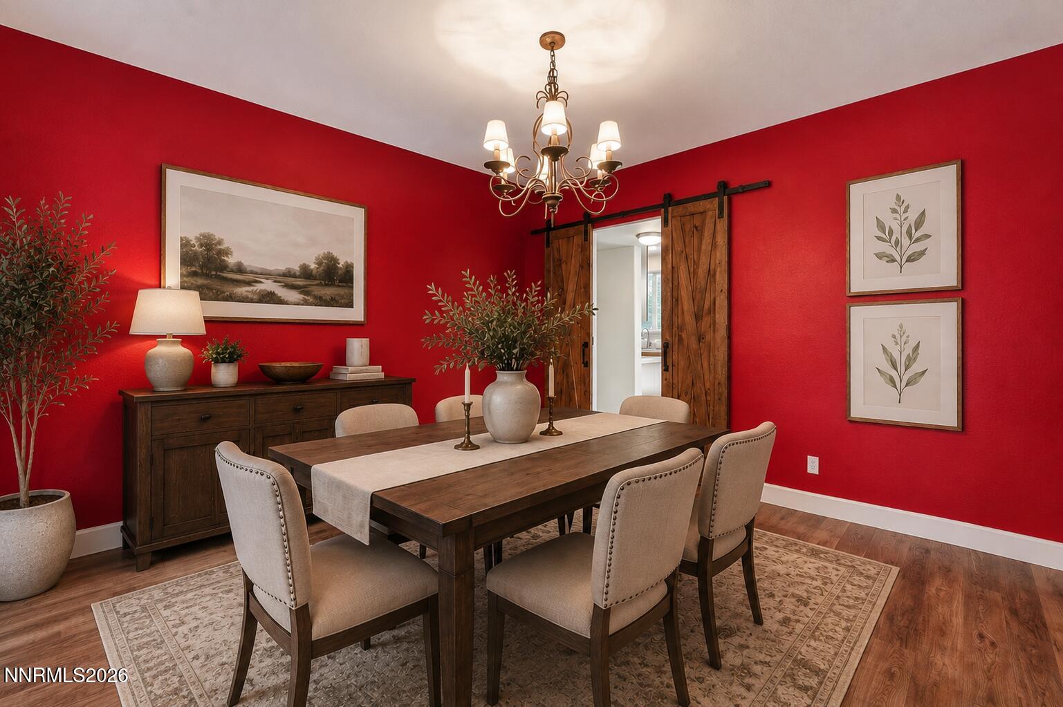 1770 Kodiak Circle Reno, NV 89511 - Photo 6 of 32 a view of a dining room with furniture a chandelier and wooden floor