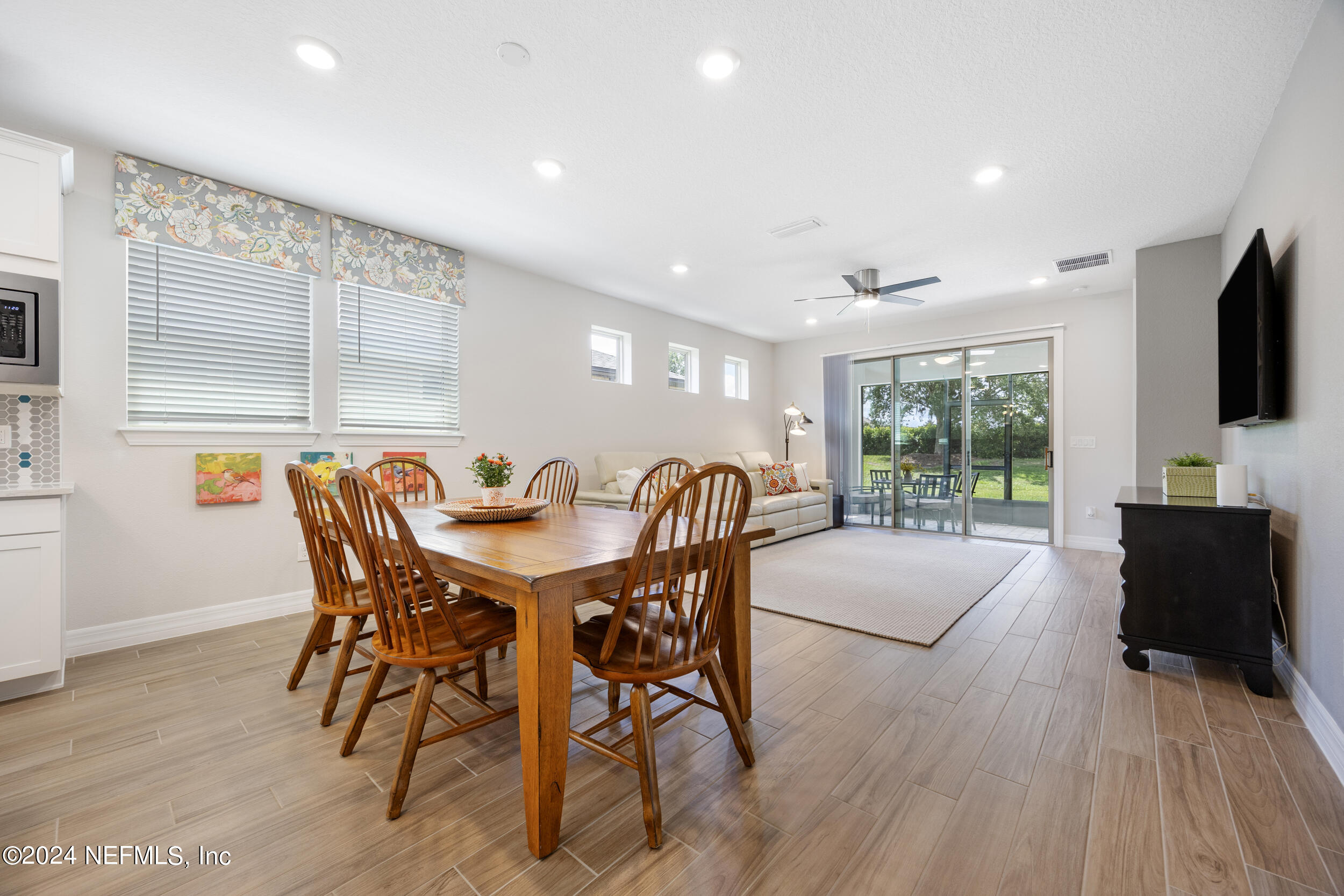 220 Rock Spg Loop St. Augustine, FL 32095 - Photo 10 of 30 a view of a dining room with furniture window and outside view