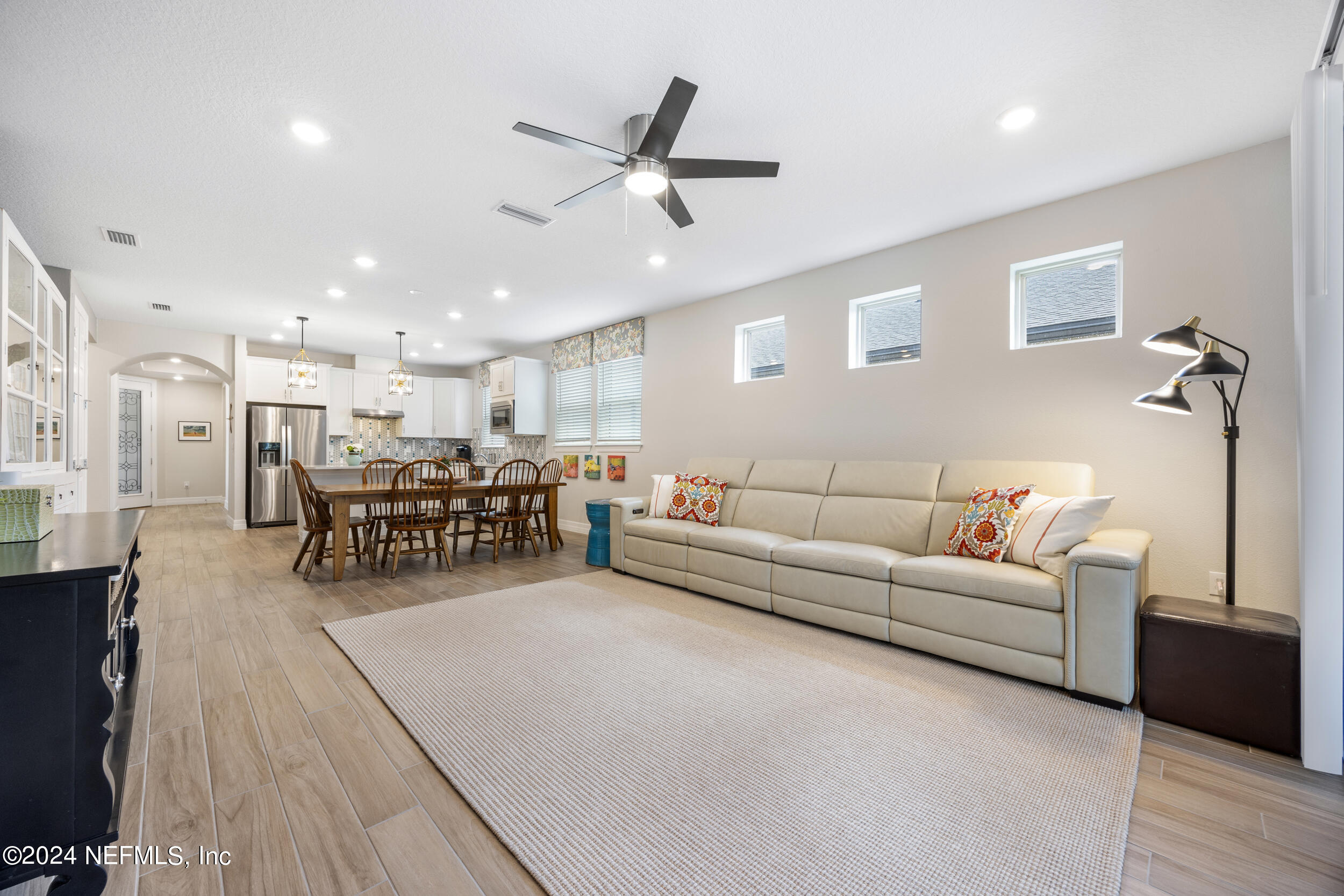 220 Rock Spg Loop St. Augustine, FL 32095 - Photo 12 of 30 a living room with furniture and a wooden floor