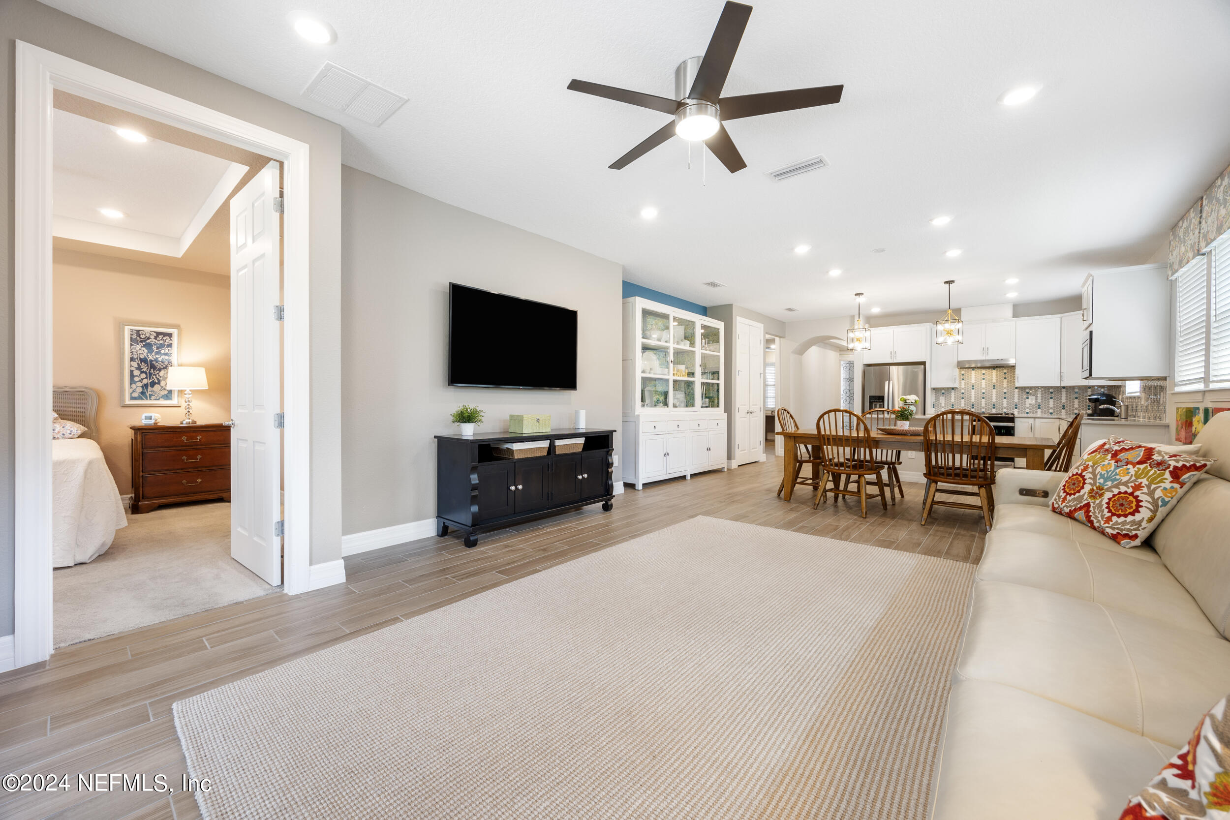 220 Rock Spg Loop St. Augustine, FL 32095 - Photo 30 of 30 a view of a livingroom with furniture and a flat screen tv