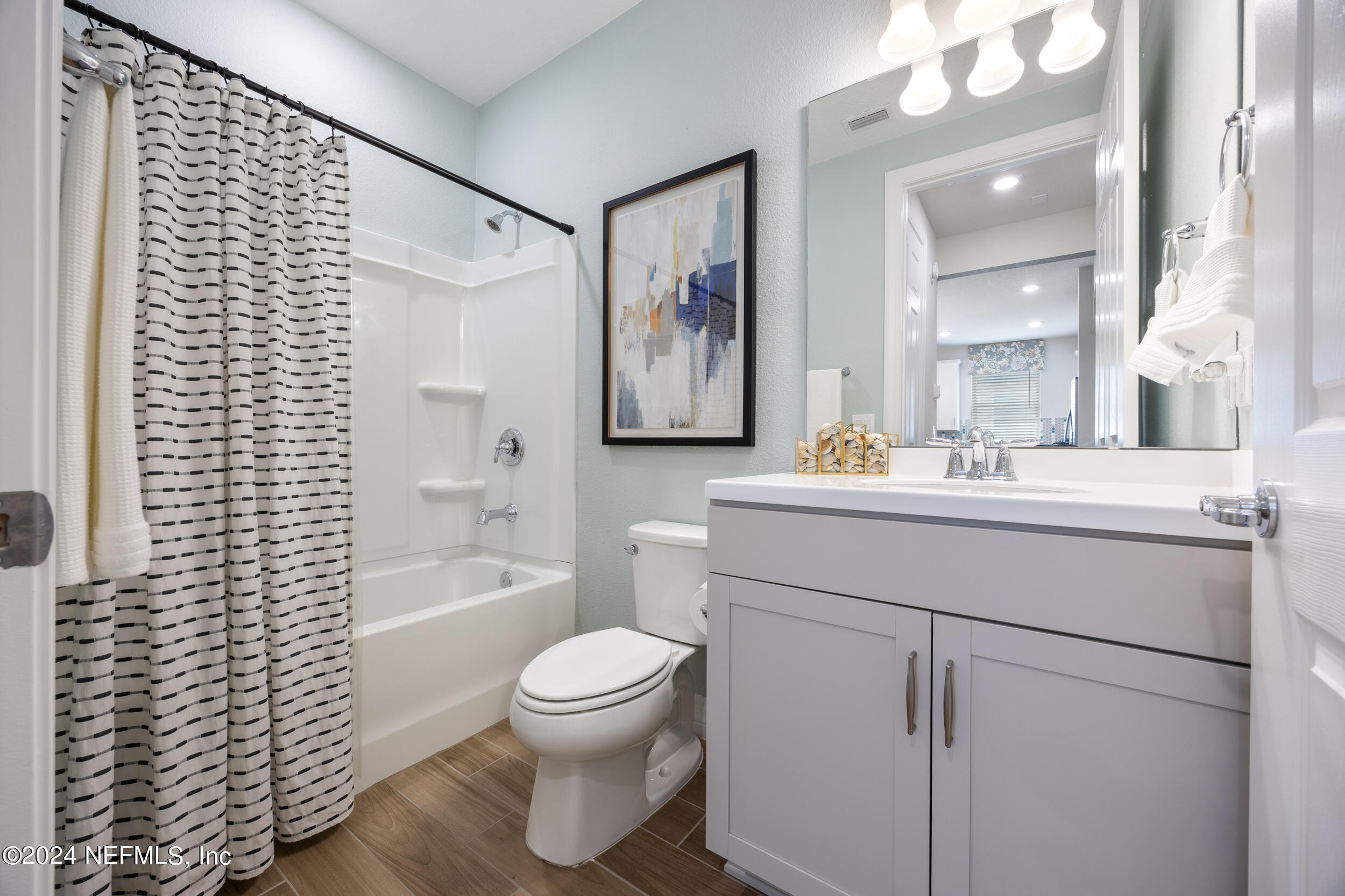 220 Rock Spg Loop St. Augustine, FL 32095 - Photo 20 of 30 a bathroom with a sink toilet and shower