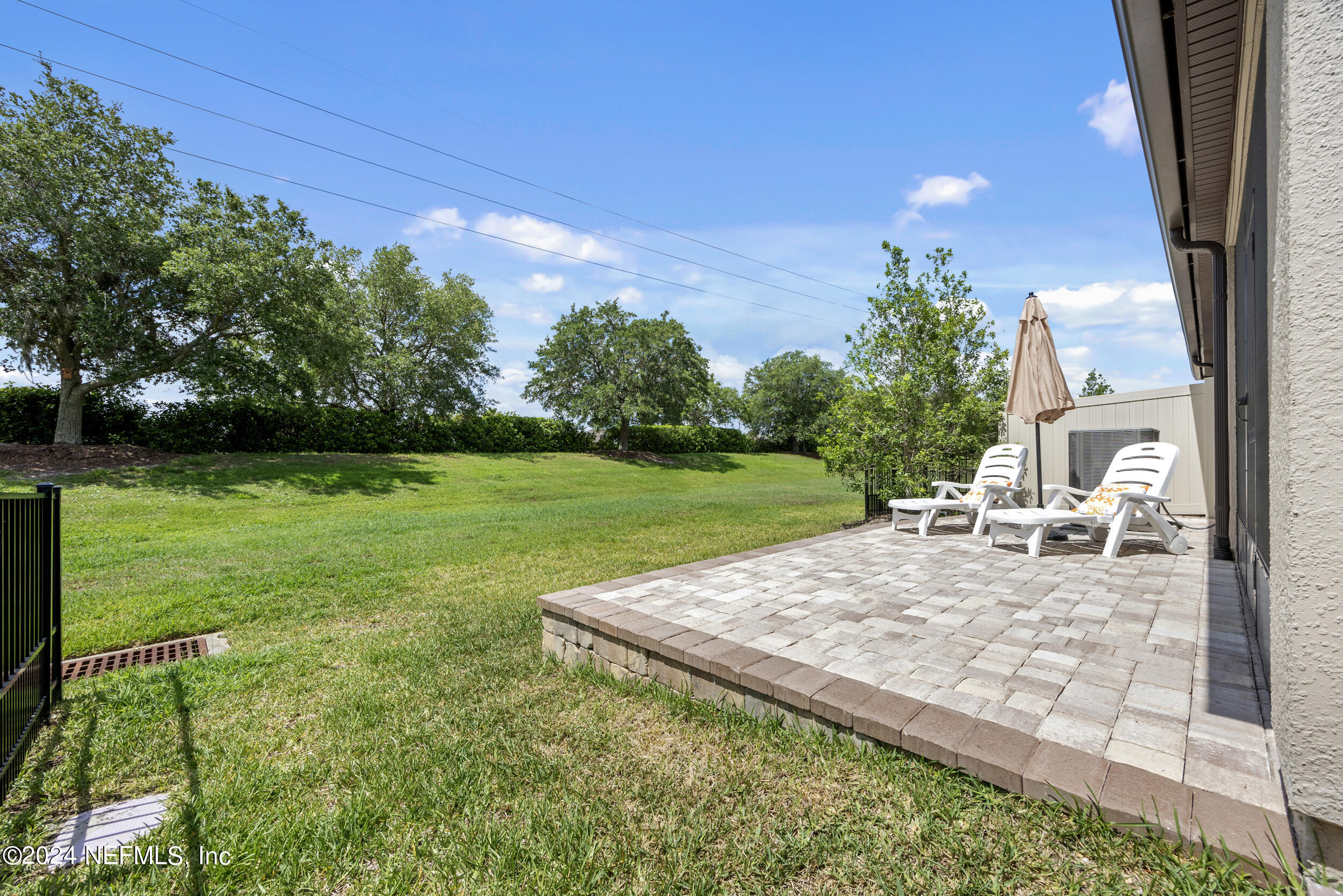 220 Rock Spg Loop St. Augustine, FL 32095 - Photo 26 of 30 a view of a backyard with sitting area