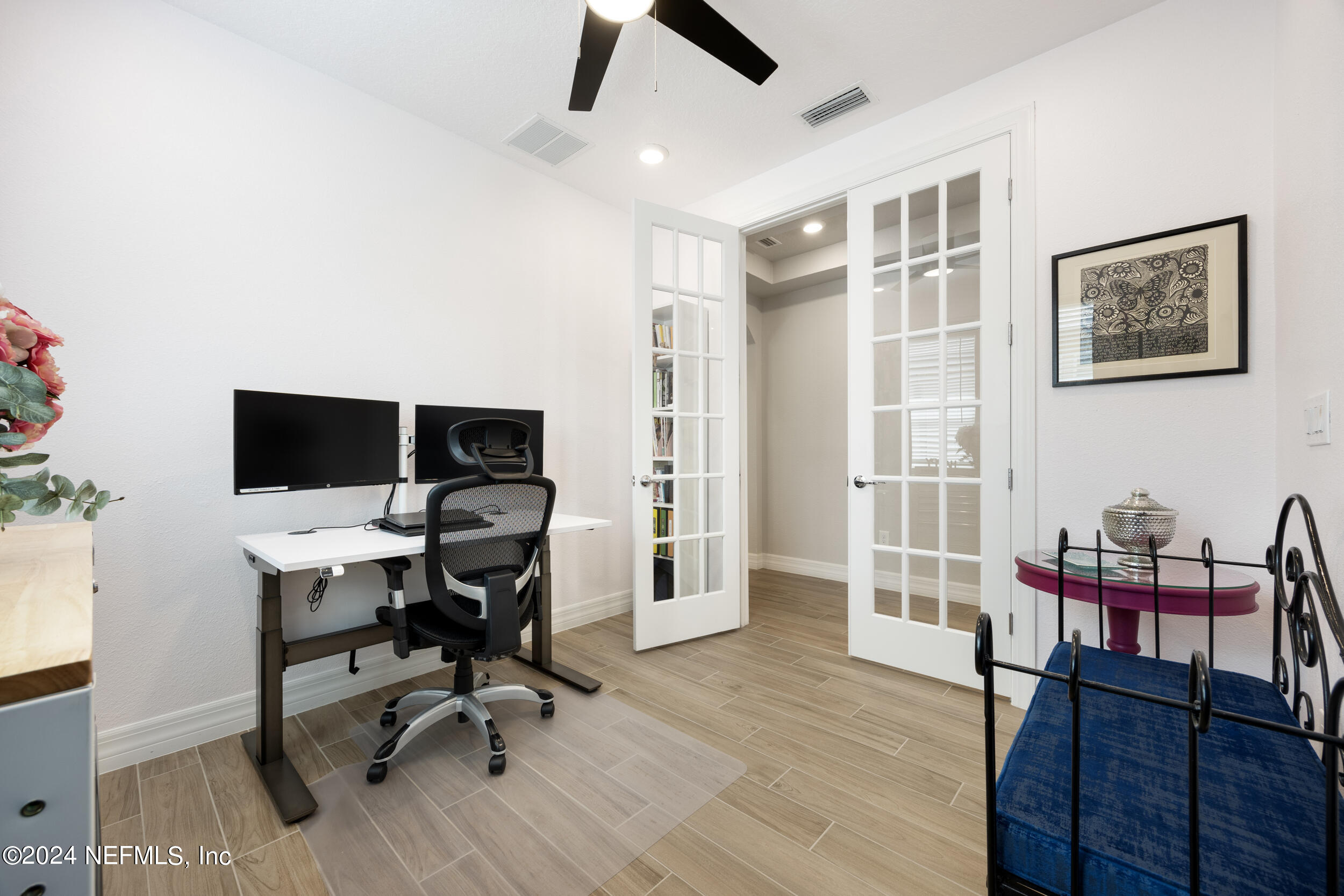220 Rock Spg Loop St. Augustine, FL 32095 - Photo 5 of 30 a view of a livingroom with workspace and a window