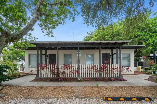 a front view of a house with a porch