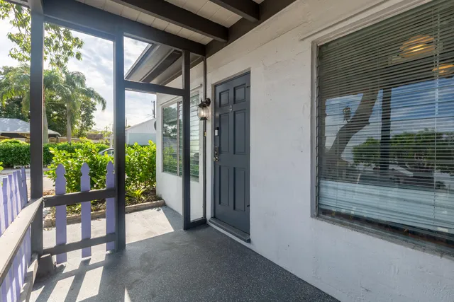 a view of porch with a furniture