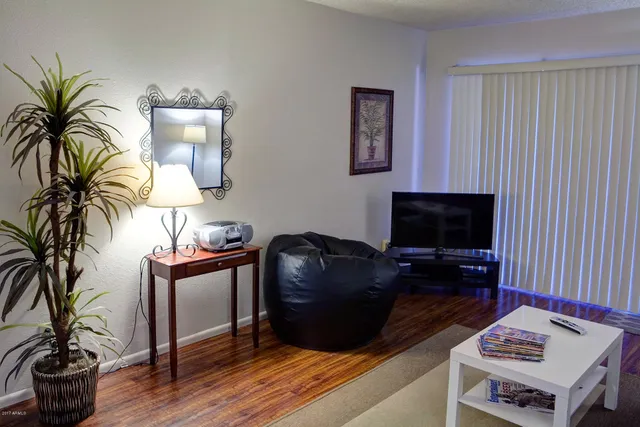 a kitchen with a sink cabinets and a stove top oven