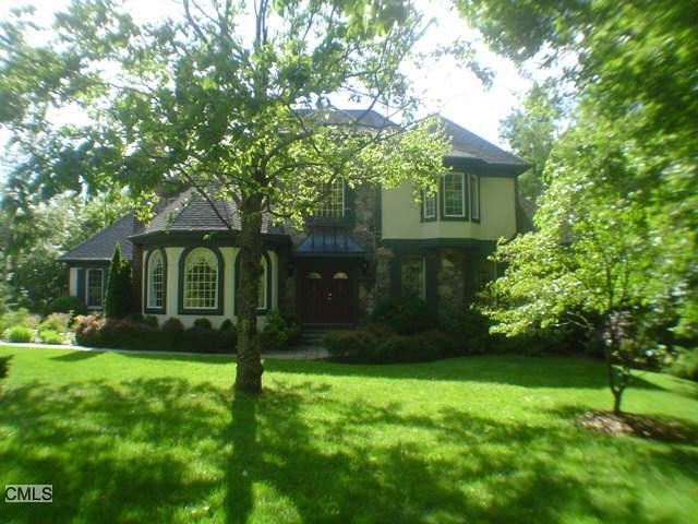 24 Mudry Farm Road Brookfield, CT 06804 - Photo 1 of 1 a front view of a house with garden