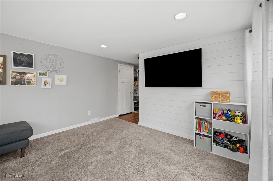 87 Kenridge Road Akron, OH 44333 - Photo 21 of 48 Recreation room with carpet, baseboards, and recessed lighting