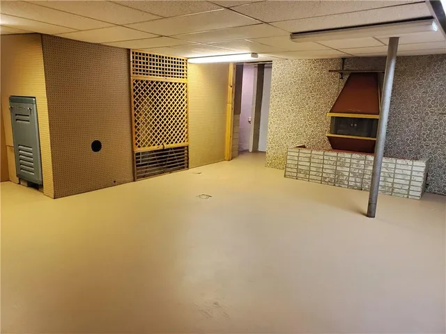 a kitchen with stainless steel appliances wooden cabinets and a sink
