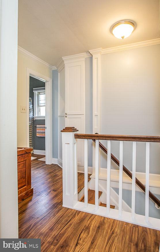 295 Sugartown Road Wayne, PA 19087 - Photo 18 of 36 a view of wooden floor and windows in a room