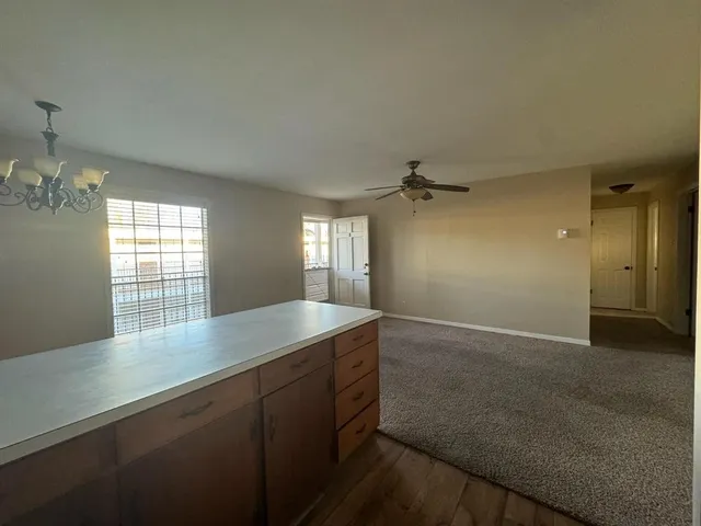 a view of a kitchen and a sink