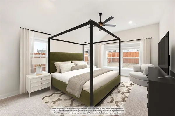 a bedroom with a bed window and walk in closet