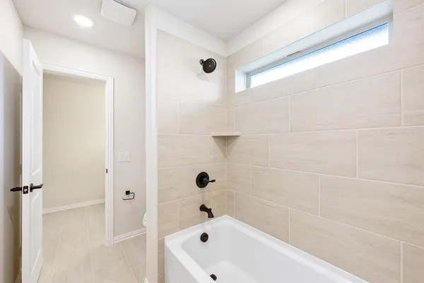 a bathroom with a bathtub