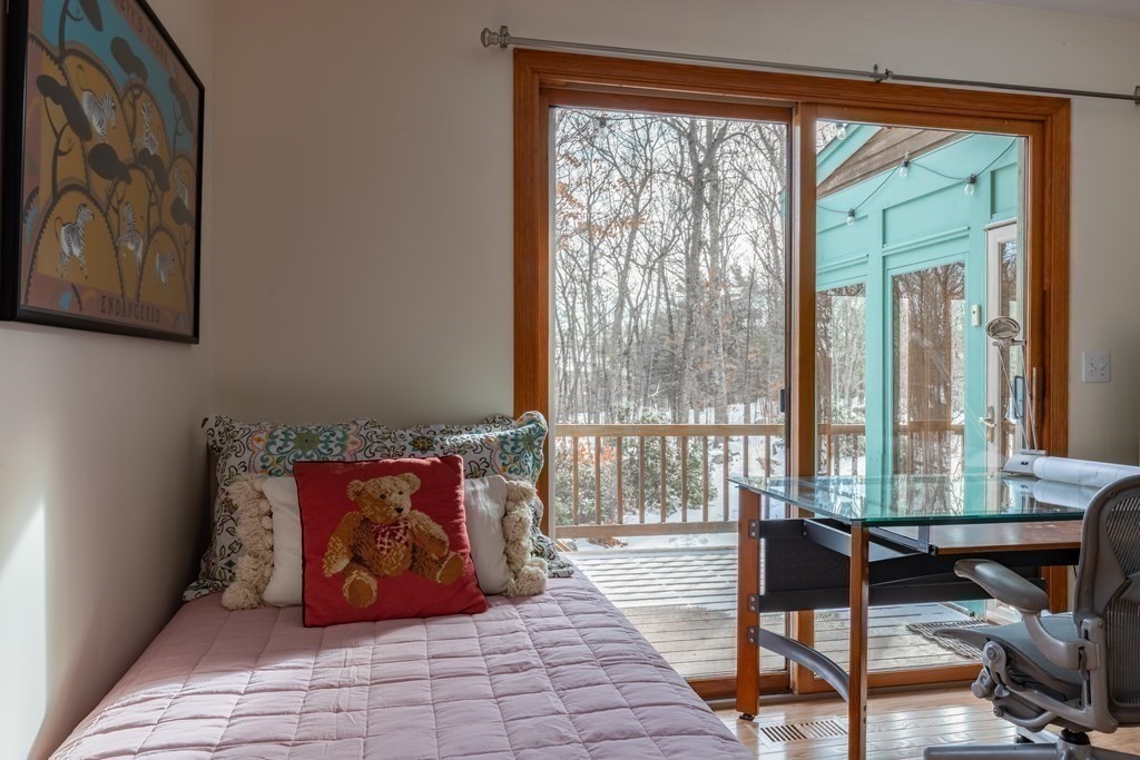 82 Nashoba Road Littleton, MA 01460 - Photo 12 of 39 a living room with furniture and a large window