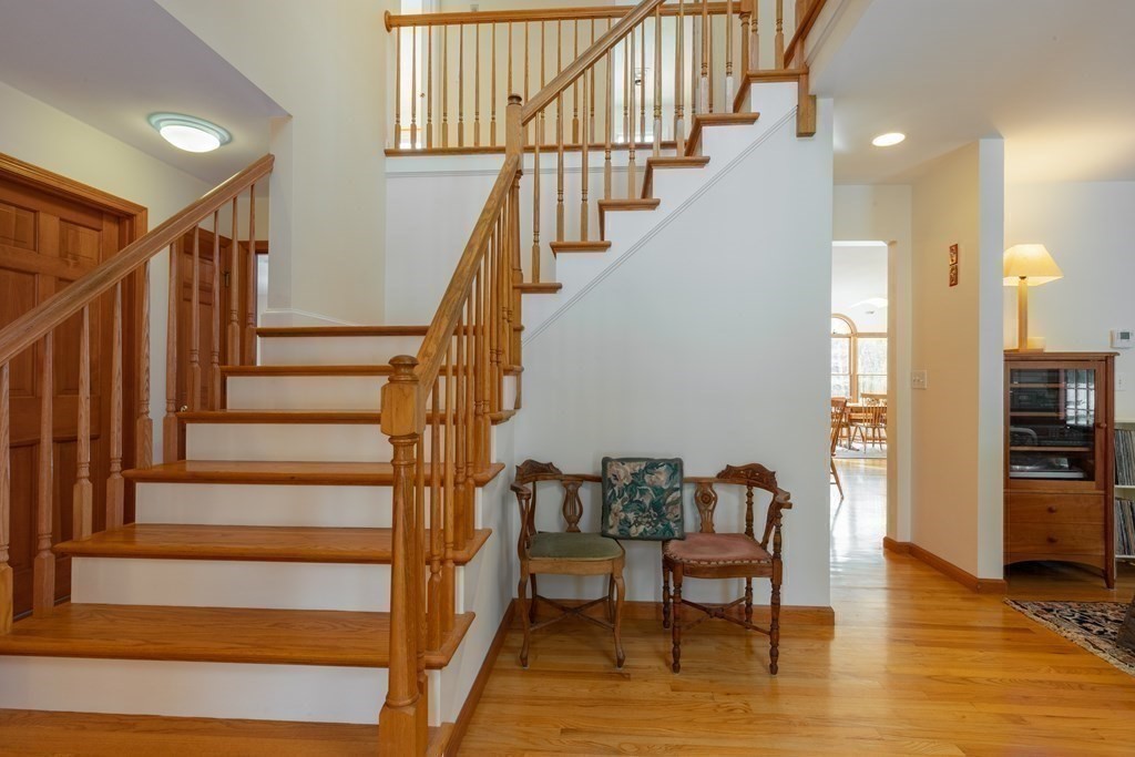 82 Nashoba Road Littleton, MA 01460 - Photo 13 of 39 a view of entryway and hall with wooden floor