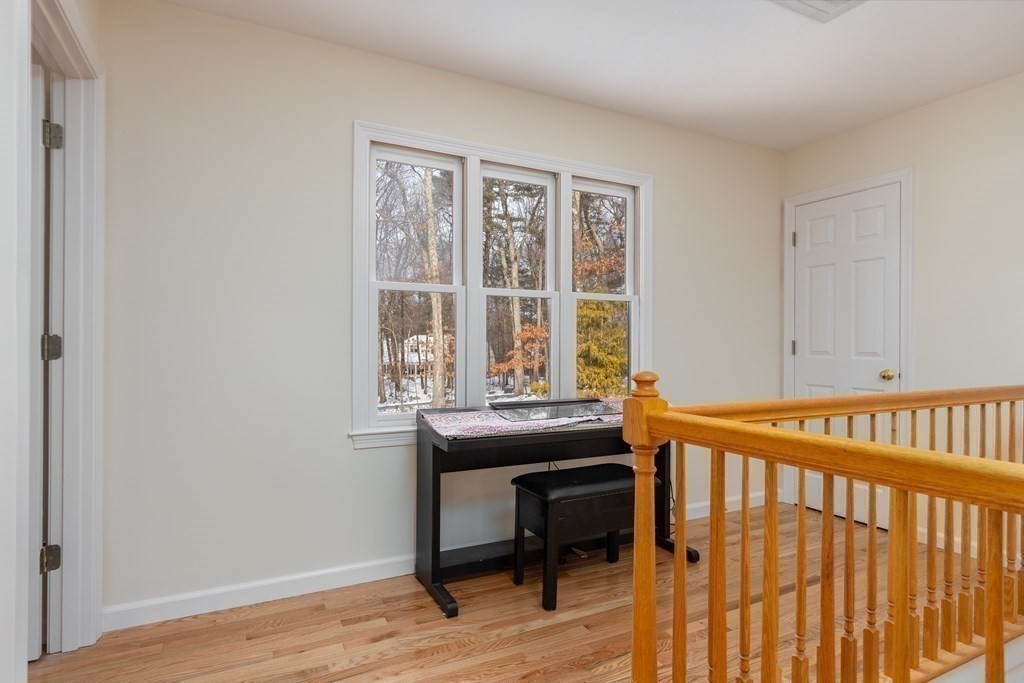 82 Nashoba Road Littleton, MA 01460 - Photo 14 of 39 a view of a room with a table and chairs