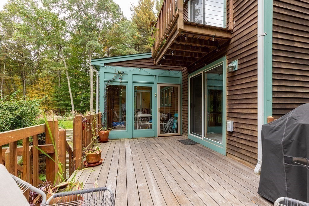 82 Nashoba Road Littleton, MA 01460 - Photo 25 of 39 a view of deck with patio