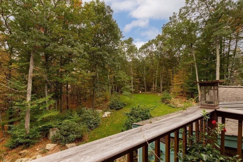 82 Nashoba Road Littleton, MA 01460 - Photo 29 of 39 a view of a balcony with an outdoor space