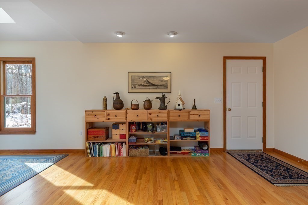 82 Nashoba Road Littleton, MA 01460 - Photo 7 of 39 a view of a workspace with furniture and window