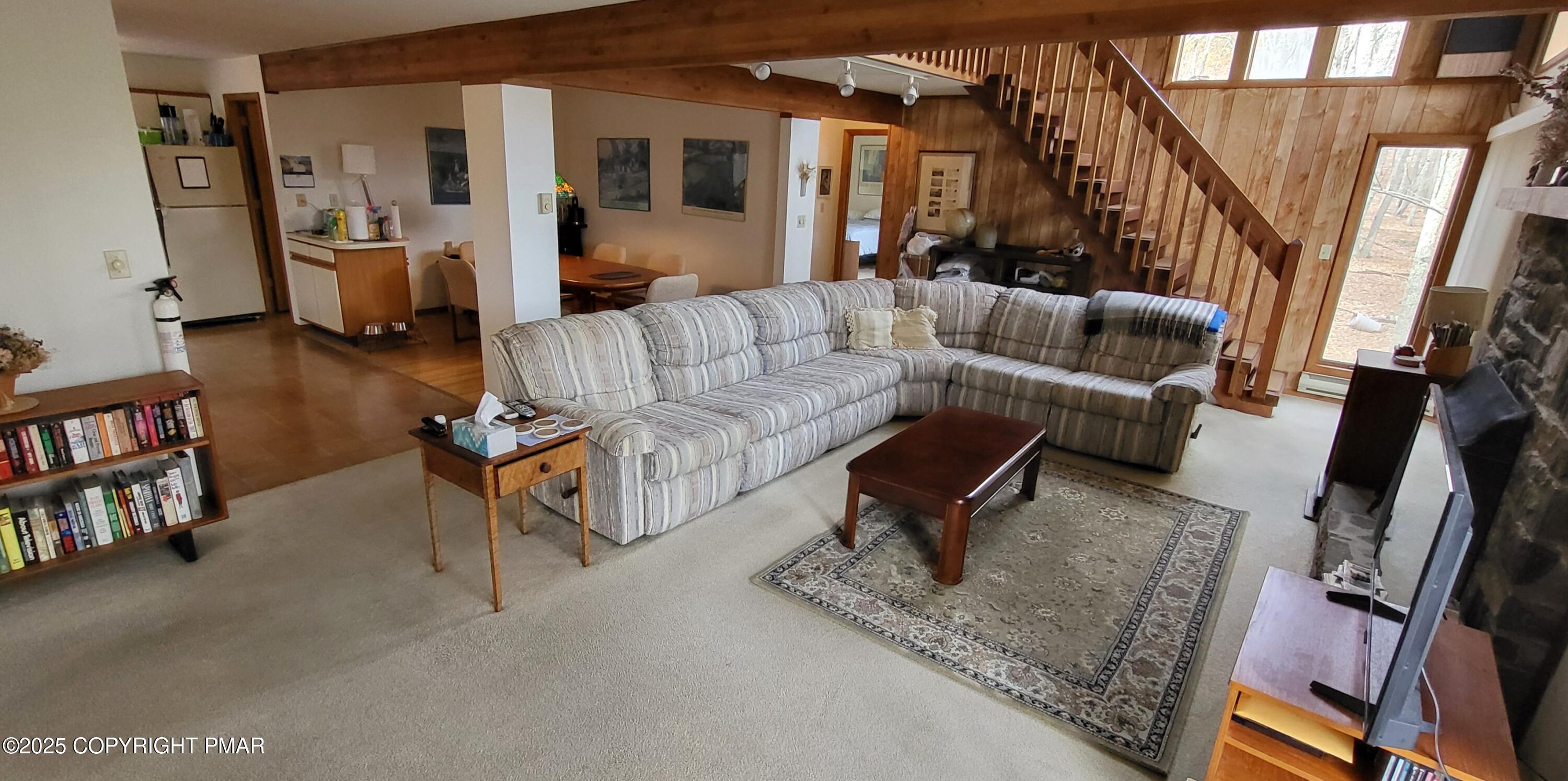 130 Bellingham Drive Bushkill, PA 18324 - Photo 15 of 65 a living room with furniture and a couch