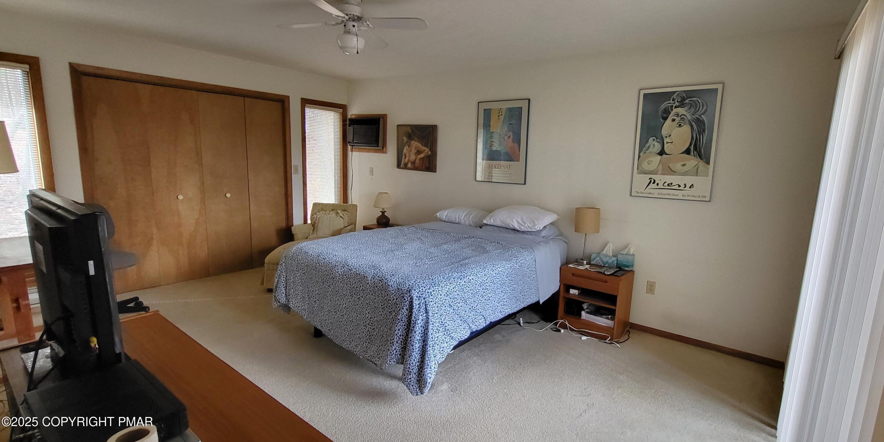 130 Bellingham Drive Bushkill, PA 18324 - Photo 18 of 65 a bedroom with a bed and a desk