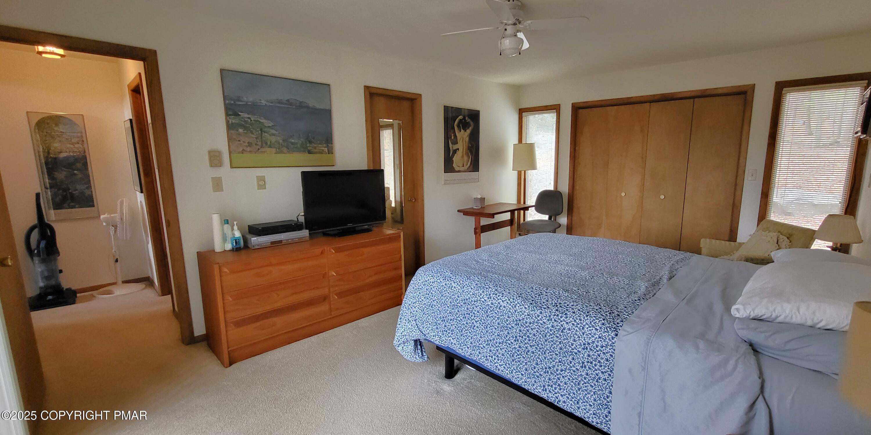 130 Bellingham Drive Bushkill, PA 18324 - Photo 20 of 65 a bed room with a bed window and a television