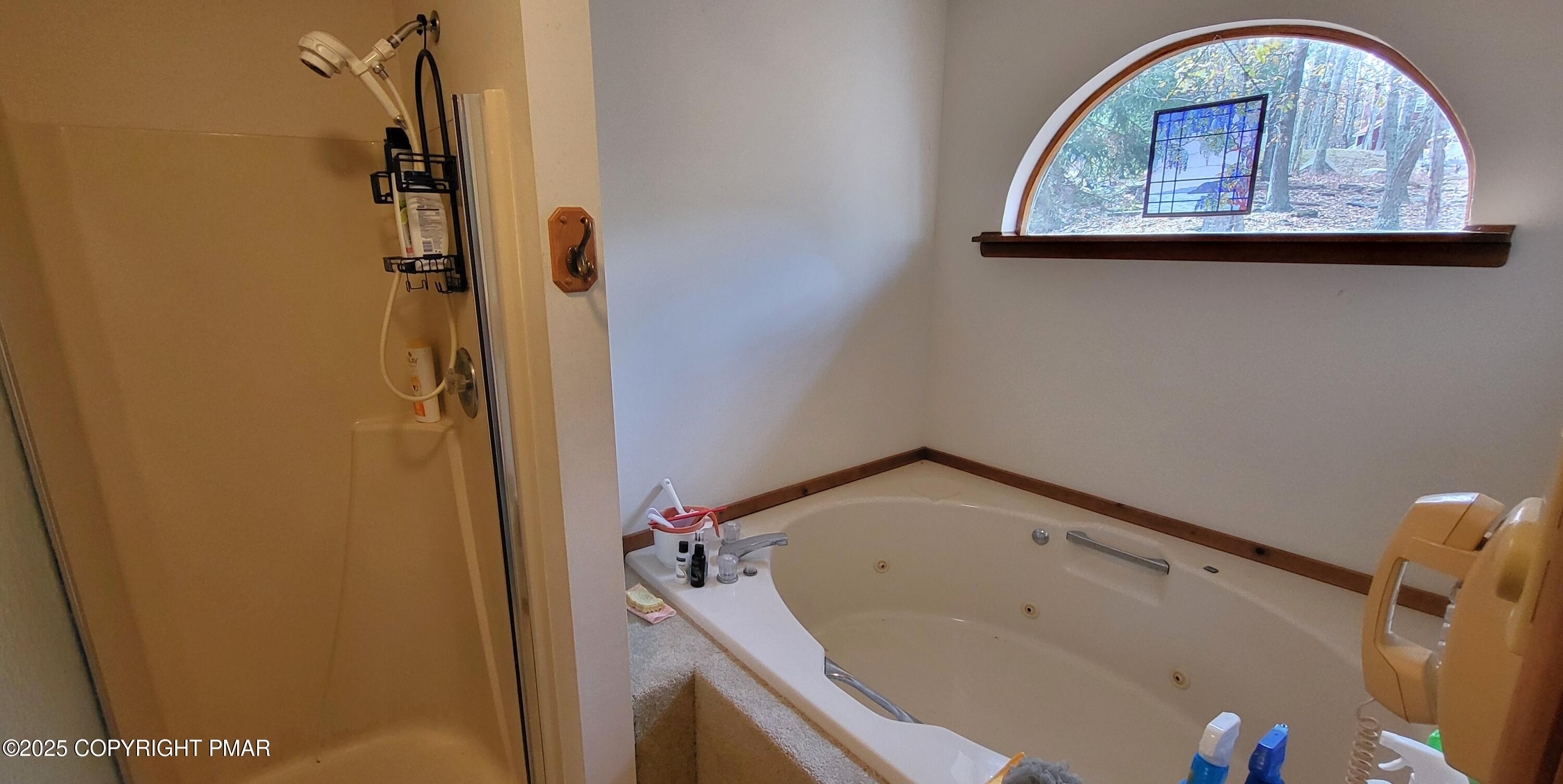 130 Bellingham Drive Bushkill, PA 18324 - Photo 22 of 65 a bathroom with a tub and shower