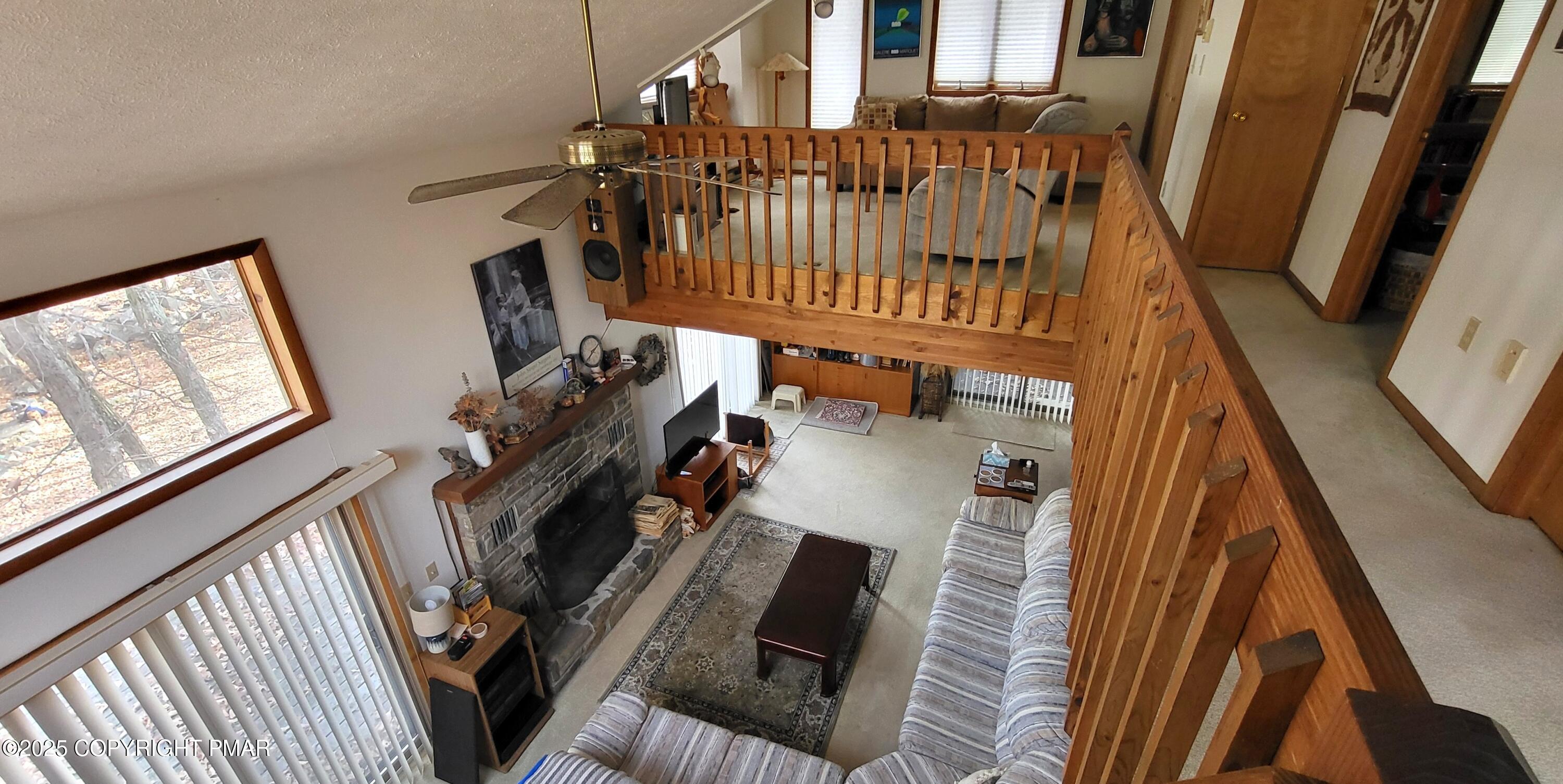 130 Bellingham Drive Bushkill, PA 18324 - Photo 25 of 65 a view of stairs and hall with wooden floor