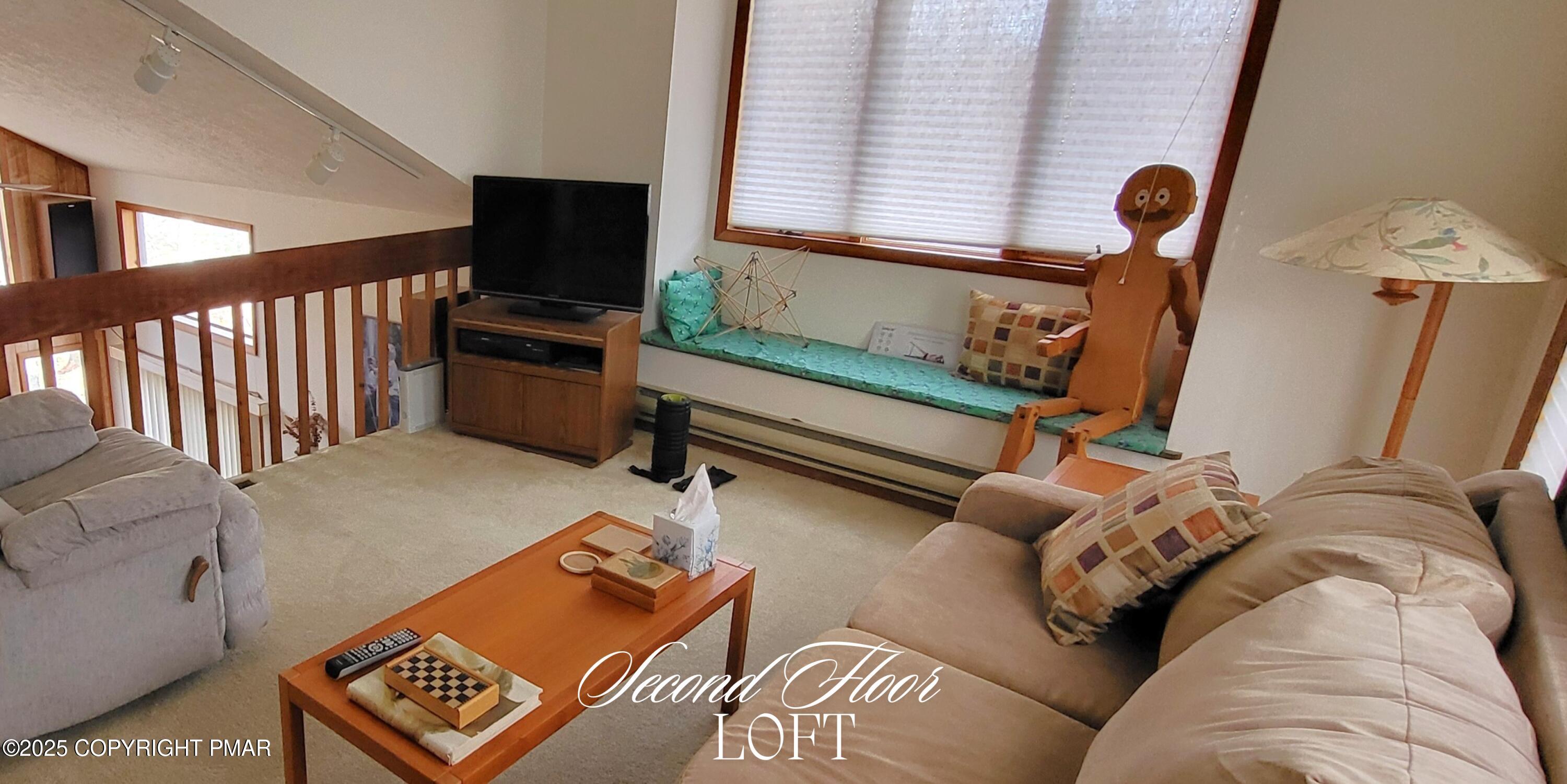 130 Bellingham Drive Bushkill, PA 18324 - Photo 26 of 65 a bedroom with furniture and a window