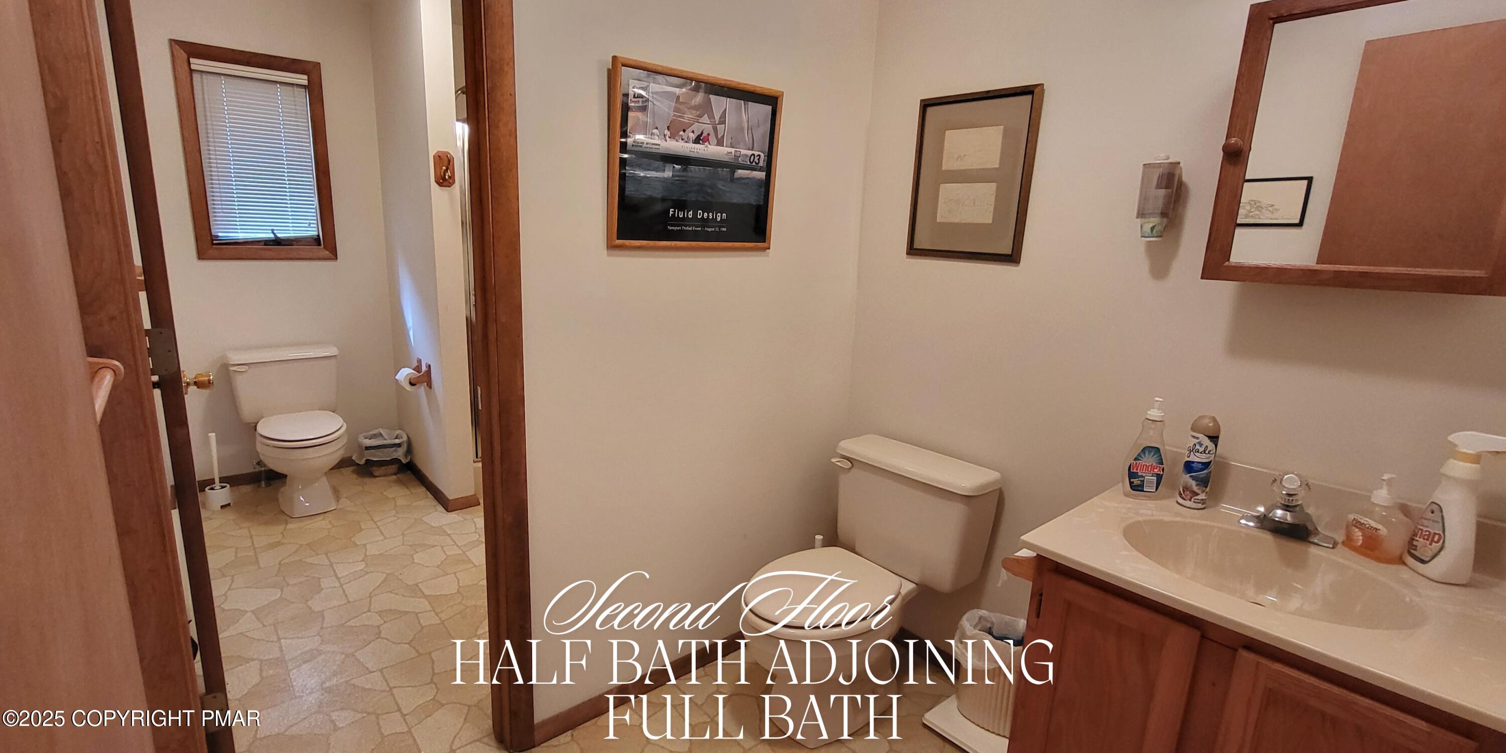 130 Bellingham Drive Bushkill, PA 18324 - Photo 30 of 65 a bathroom with a sink toilet and vanity