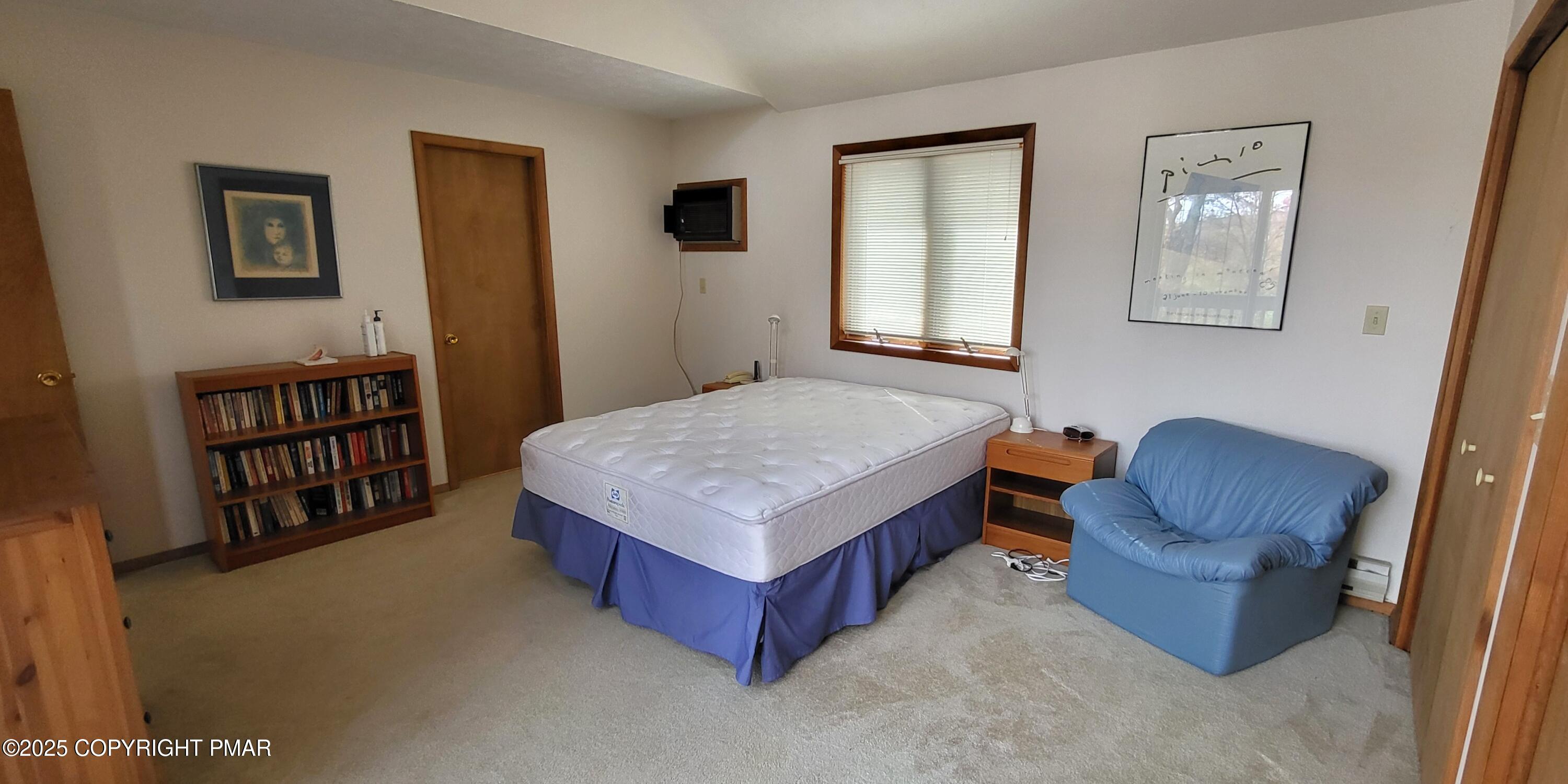 130 Bellingham Drive Bushkill, PA 18324 - Photo 33 of 65 a living room with furniture and a window