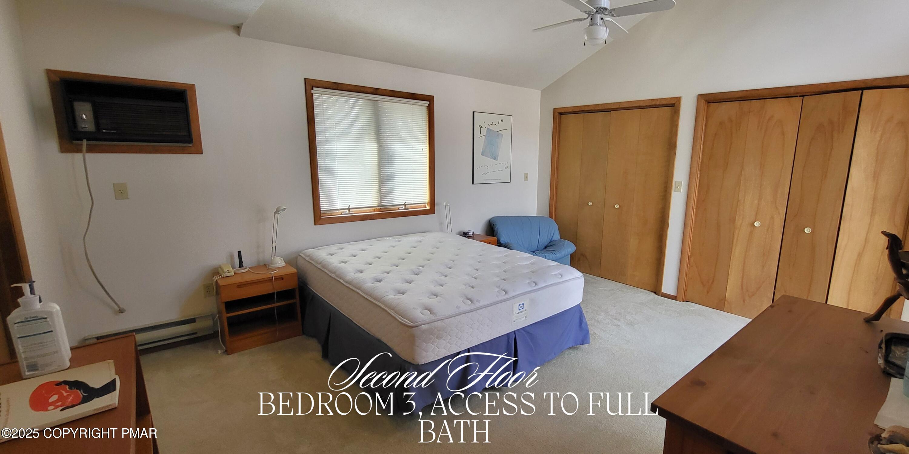 130 Bellingham Drive Bushkill, PA 18324 - Photo 33 of 65 a living room with furniture and a flat screen tv