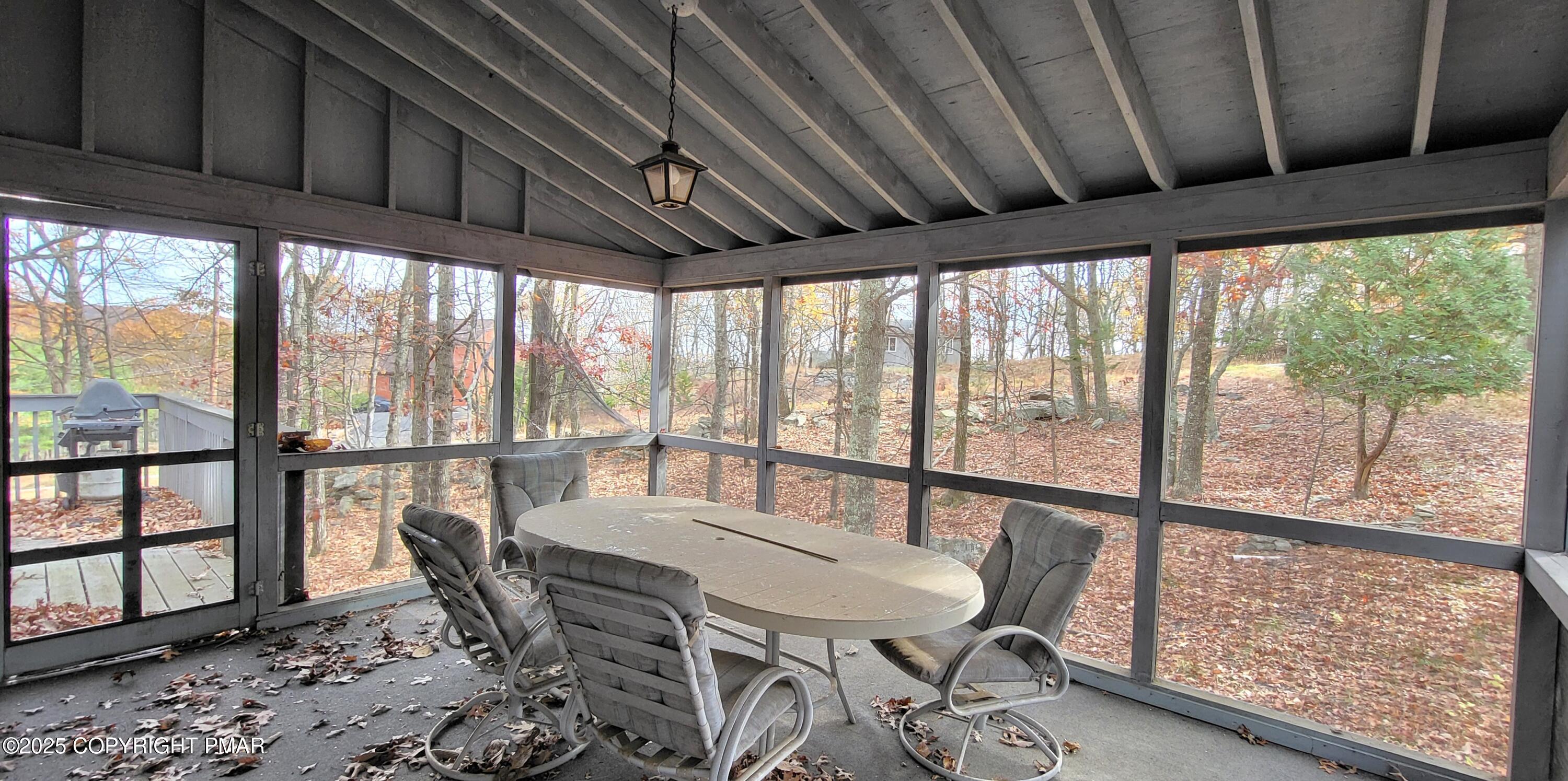 130 Bellingham Drive Bushkill, PA 18324 - Photo 35 of 65 a view of a large dining room with furniture window and outside view