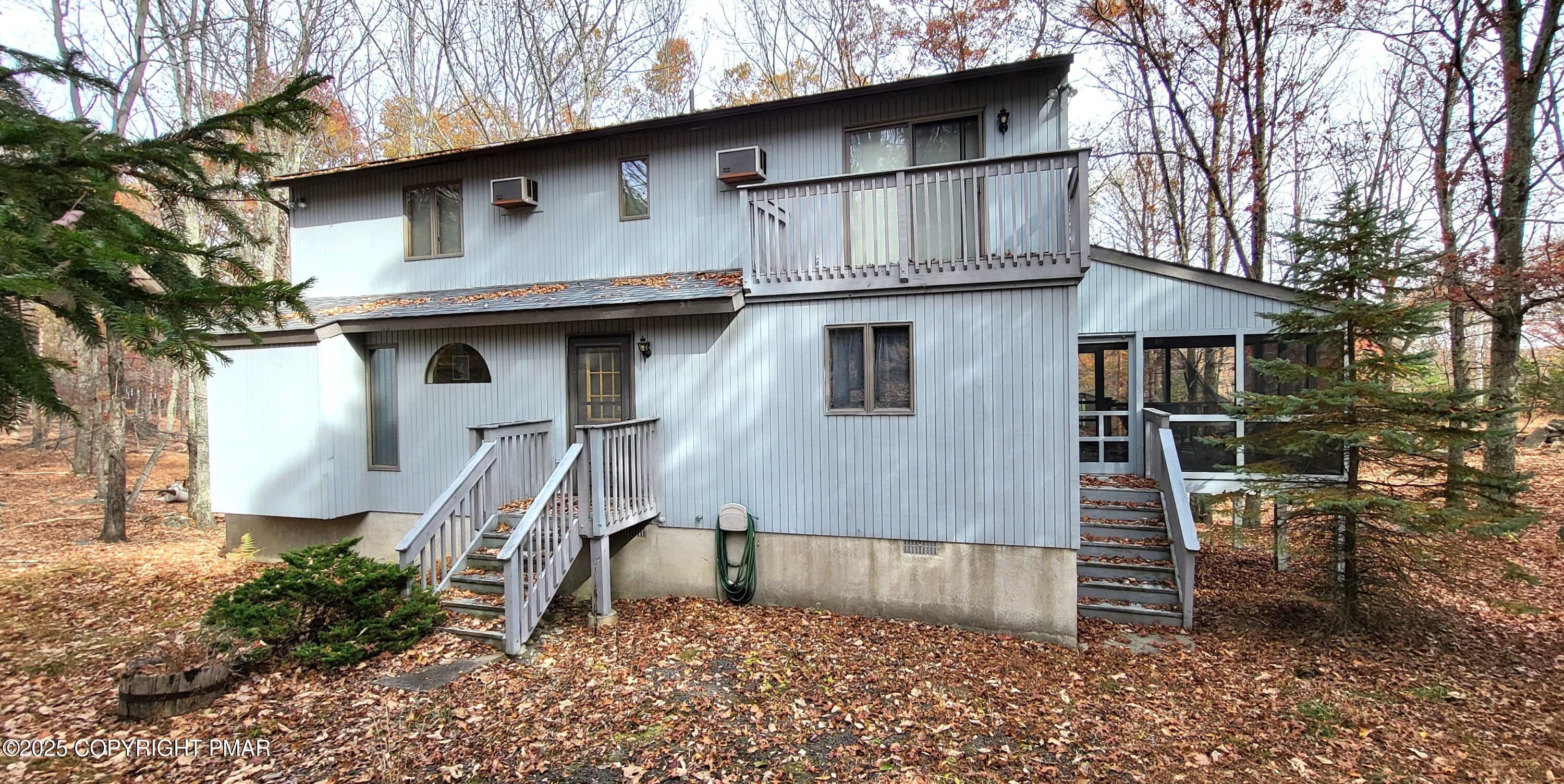 130 Bellingham Drive Bushkill, PA 18324 - Photo 36 of 65 a front view of a house with garden