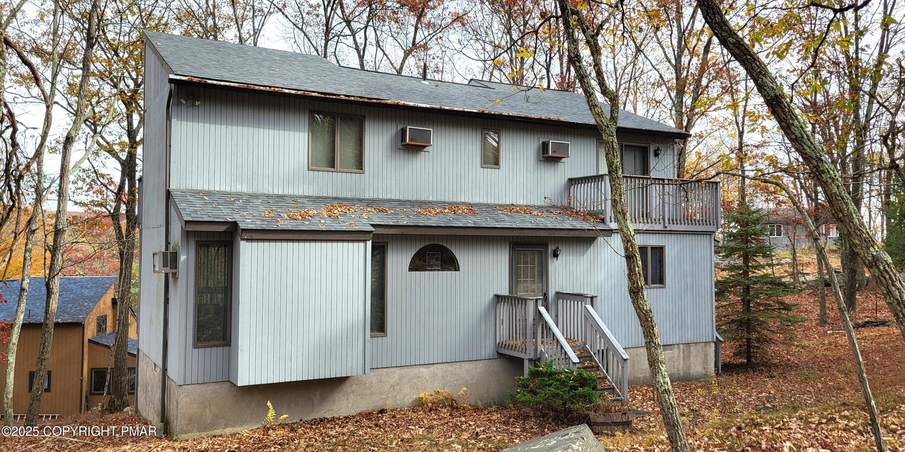 130 Bellingham Drive Bushkill, PA 18324 - Photo 37 of 65 a front view of a house with a yard