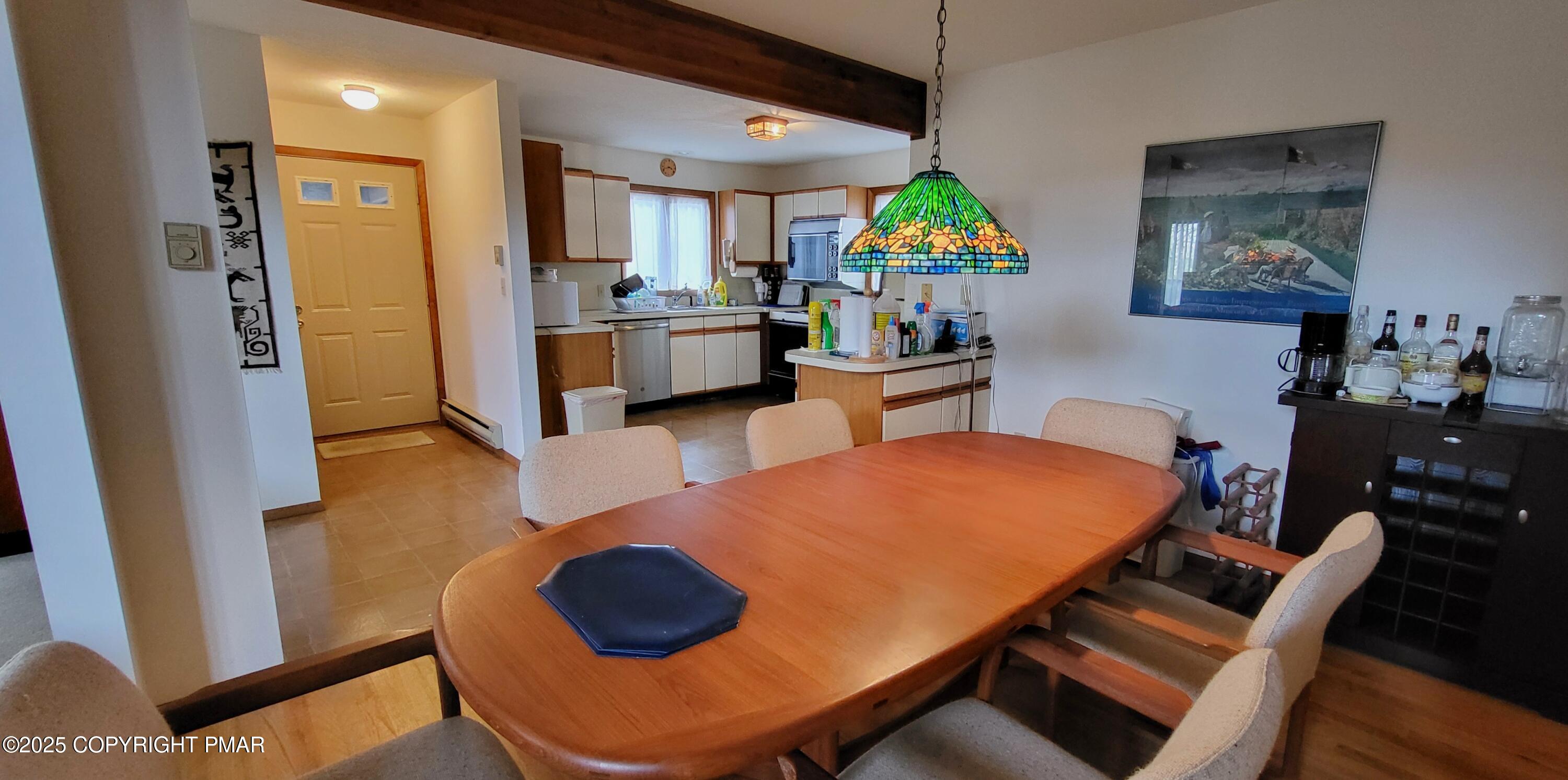 130 Bellingham Drive Bushkill, PA 18324 - Photo 9 of 65 a living room with furniture and a wooden floor