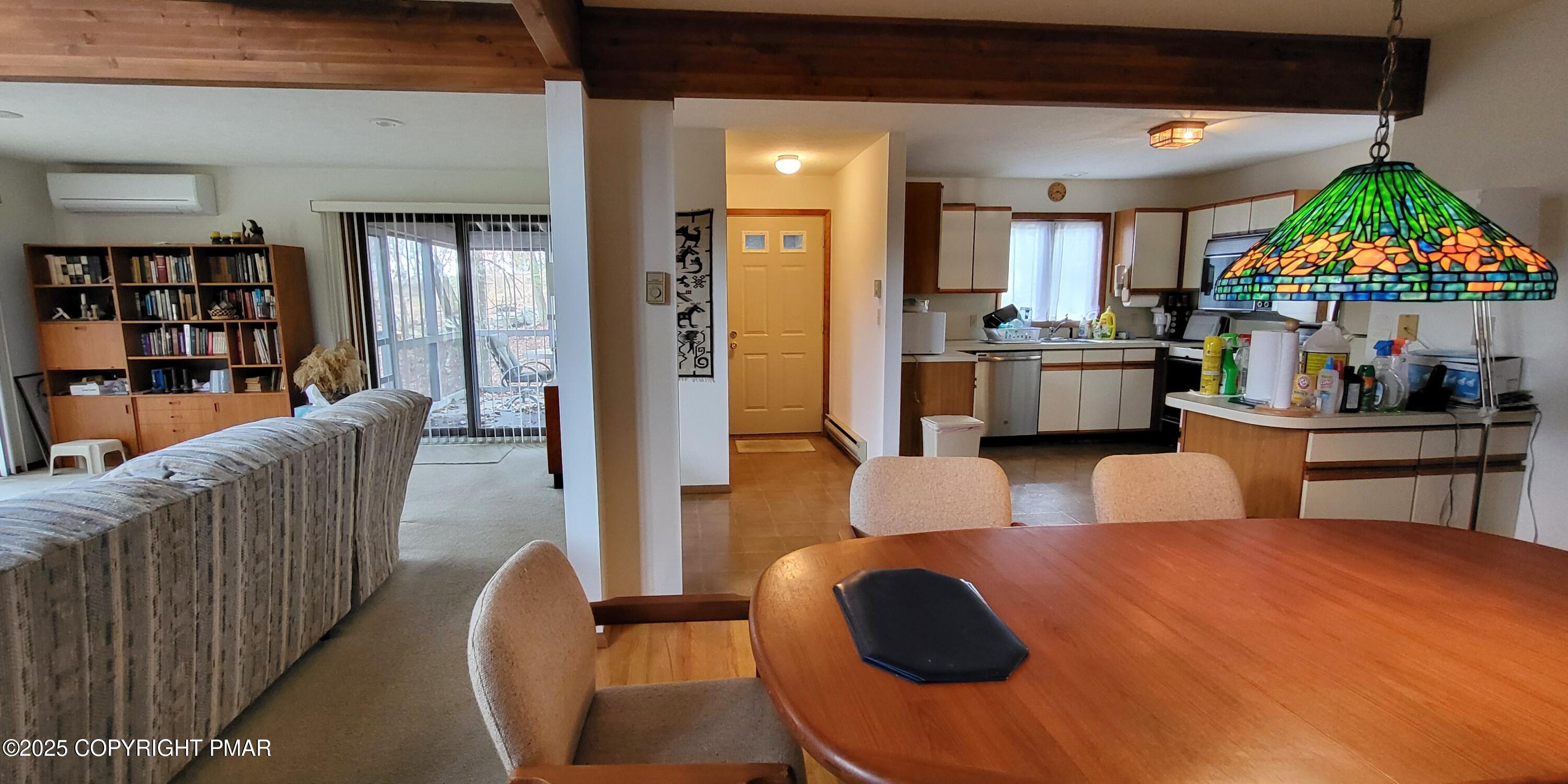 130 Bellingham Drive Bushkill, PA 18324 - Photo 9 of 65 a living room with furniture and a wooden floor