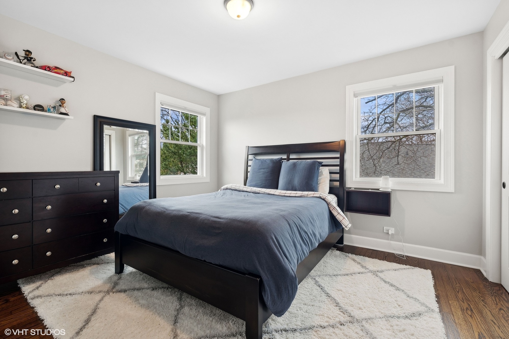 87 Ridge Road Highland Park, IL 60035 - Photo 16 of 27 a bedroom with a large bed and a window