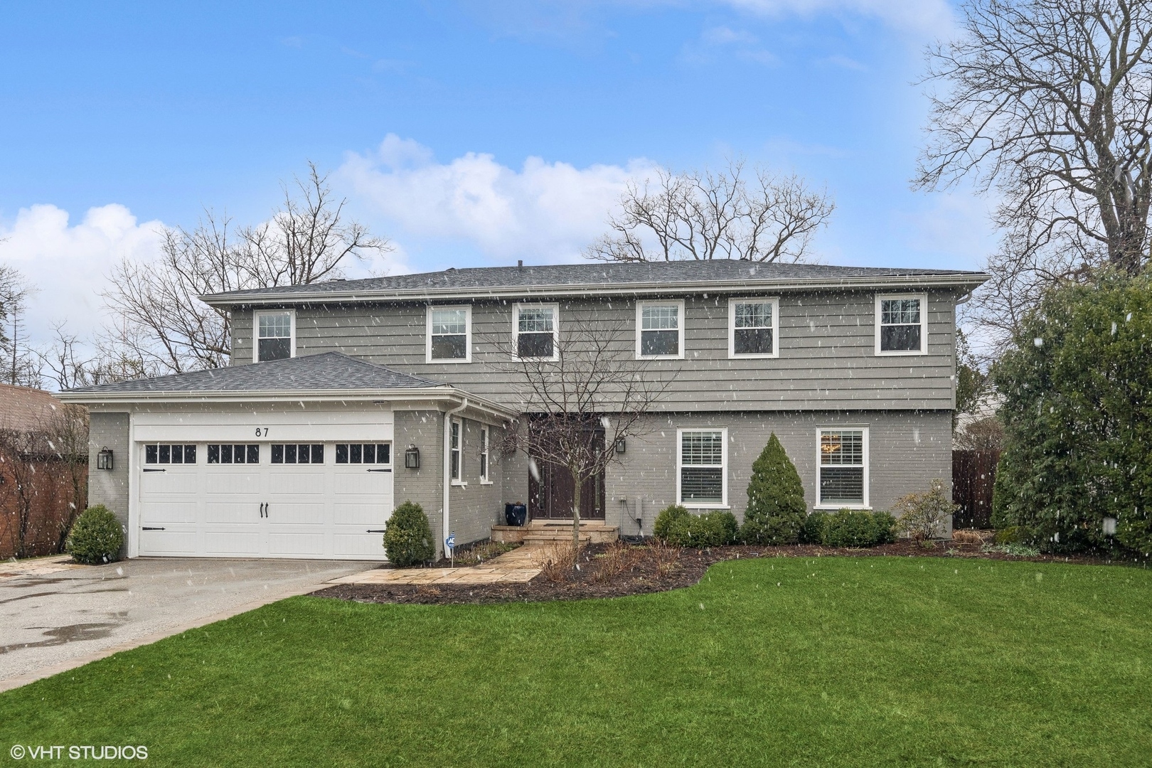 87 Ridge Road Highland Park, IL 60035 - Photo 2 of 27 front view of a house with a yard