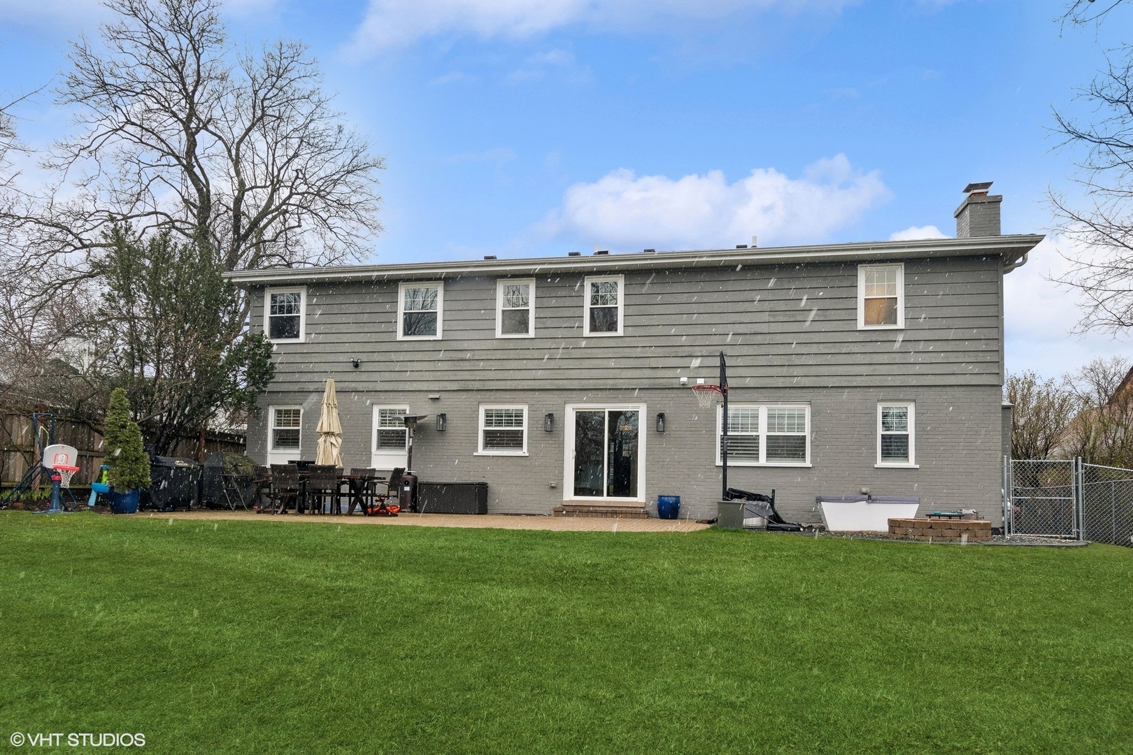 87 Ridge Road Highland Park, IL 60035 - Photo 24 of 27 a front view of house with yard and green space