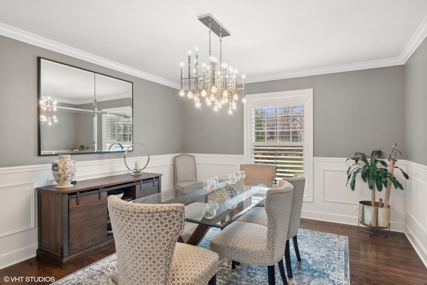 87 Ridge Road Highland Park, IL 60035 - Photo 5 of 27 a living room with furniture and a chandelier