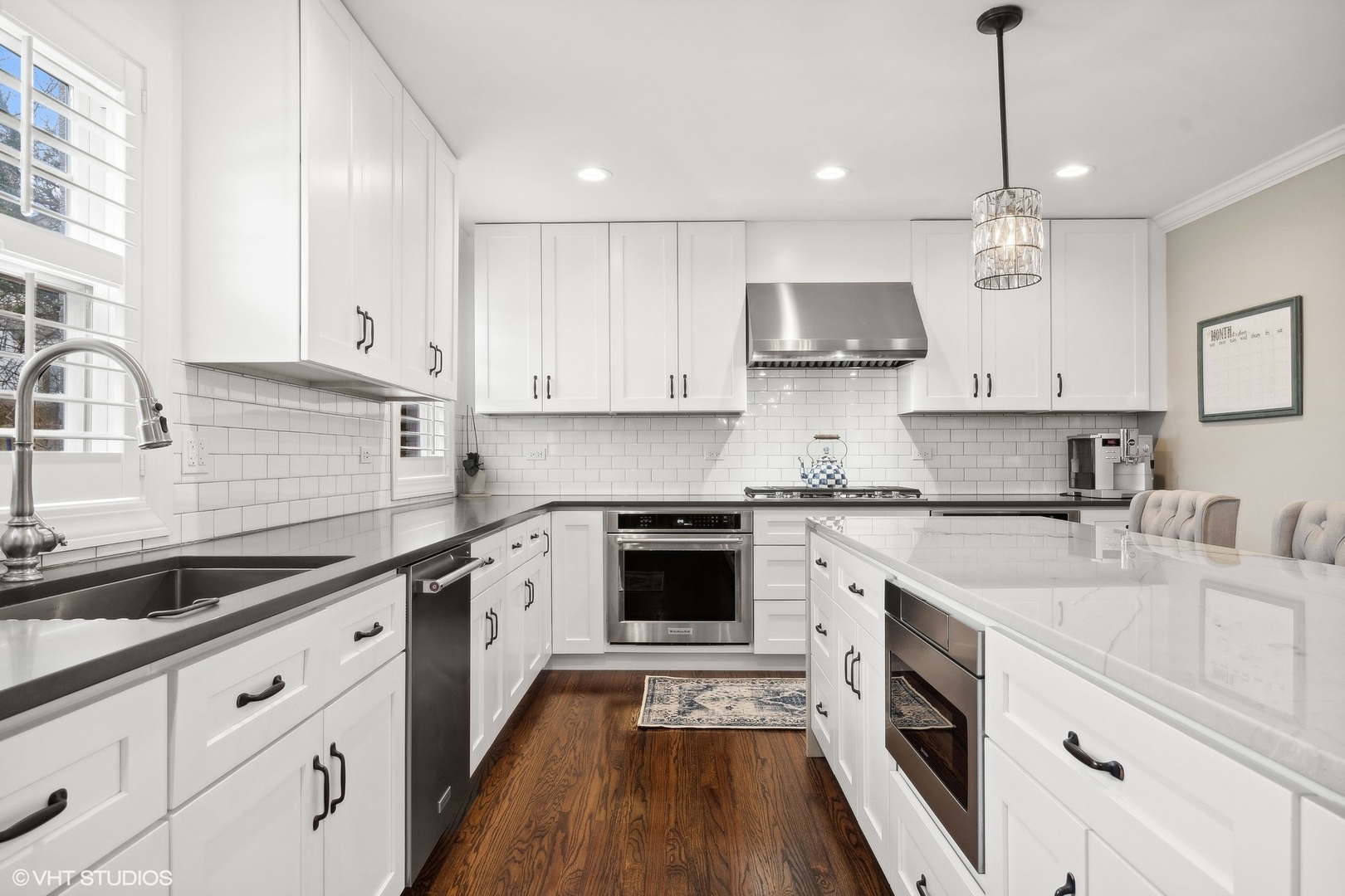 87 Ridge Road Highland Park, IL 60035 - Photo 7 of 27 a kitchen with stainless steel appliances granite countertop a stove sink and cabinets