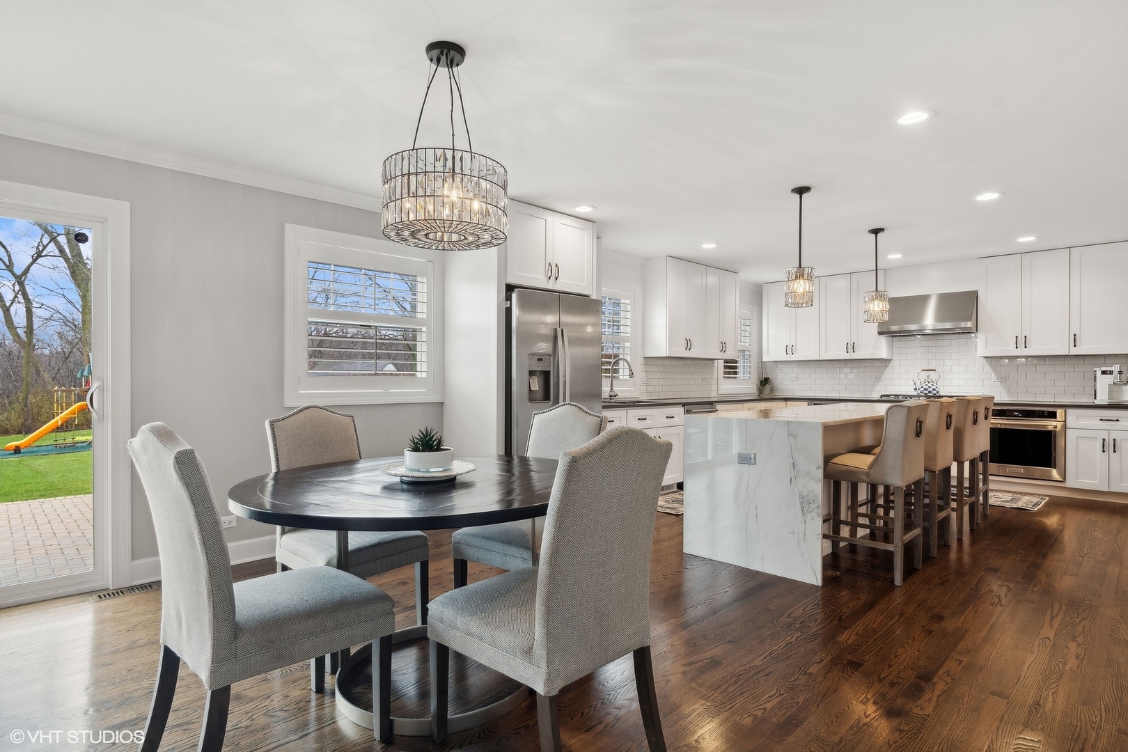 87 Ridge Road Highland Park, IL 60035 - Photo 8 of 27 a dining room with furniture and wooden floor