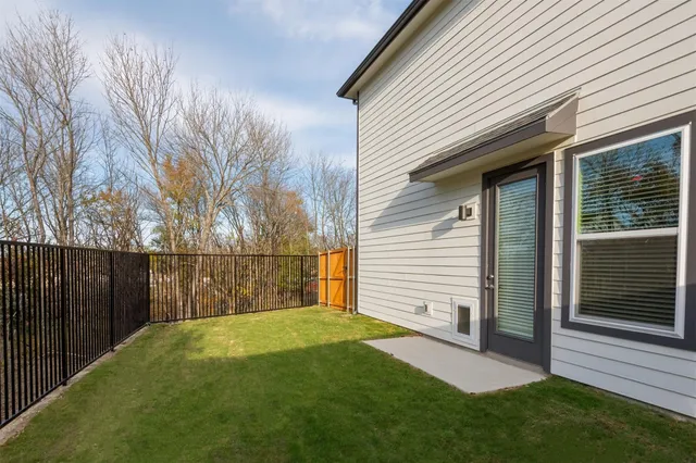 a view of a backyard with a garden