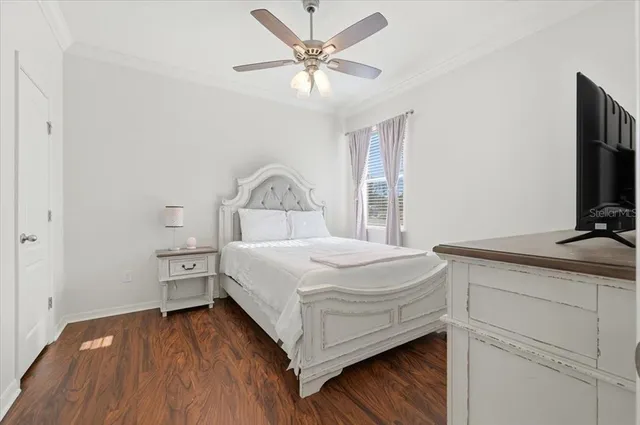 a bathroom with a toilet a sink and a mirror